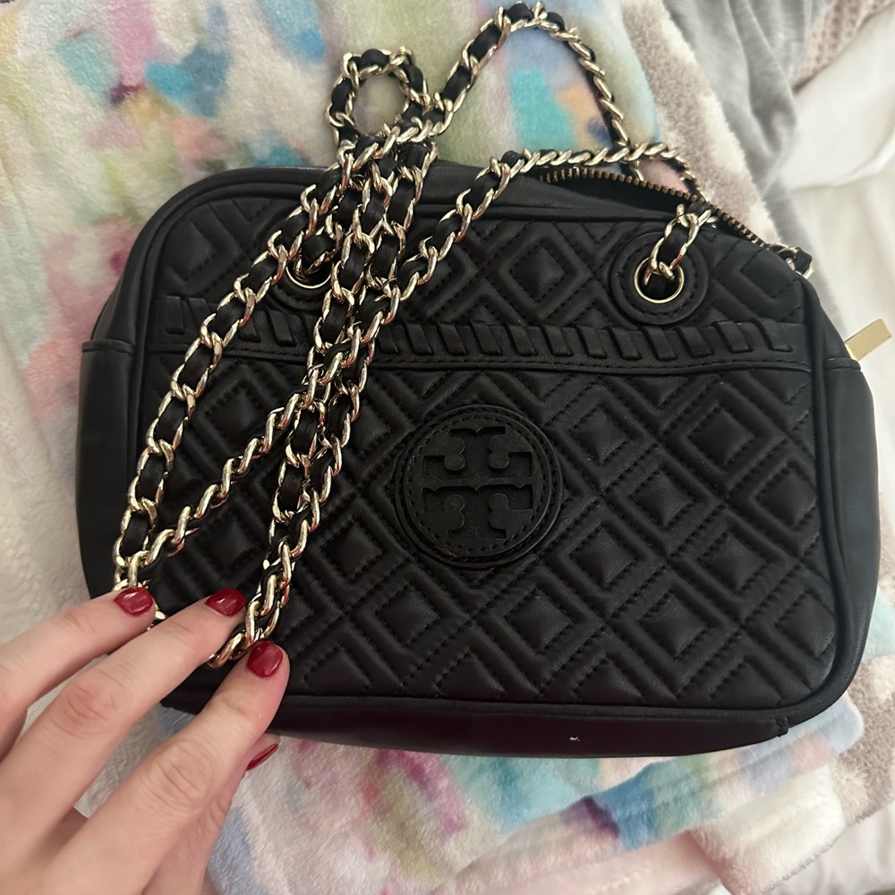 Black and Gold cross body/arm carry Tory Burch purse